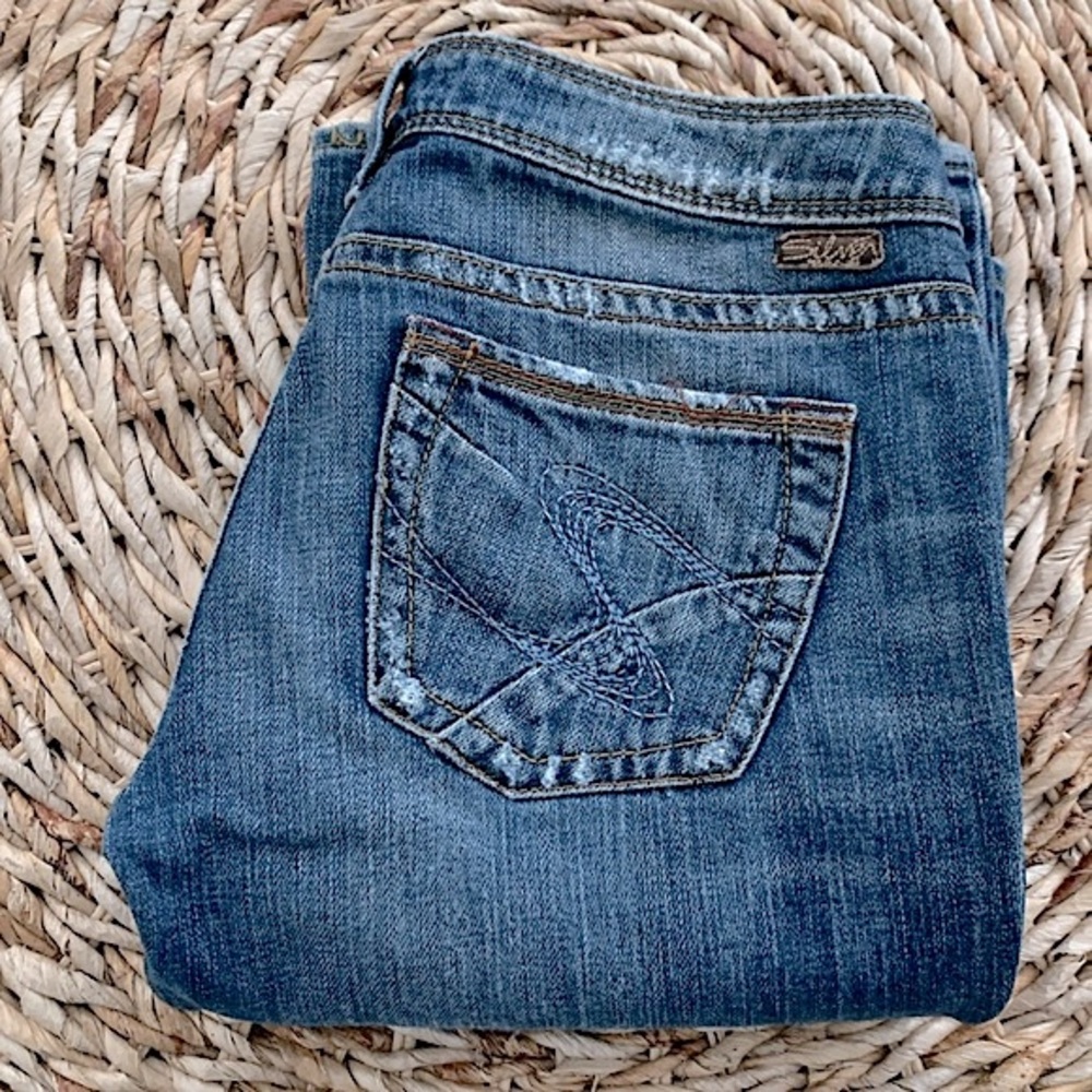 Silver Tina Distressed Low Rise Bootcut Jean